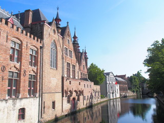 Naklejka premium Bruges cityscape with water canal and bridge, Flanders, Belgium