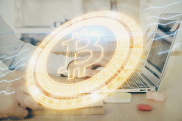 Blockchain theme hud with man working on computer on background. Concept of crypto chain. Double exposure.