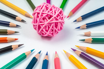 Naklejka premium Compete for your goal - Still Life Conceptual - Color Pencils on isolated backround