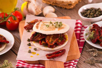 Tigella bread with sun-dried tomatoes.
