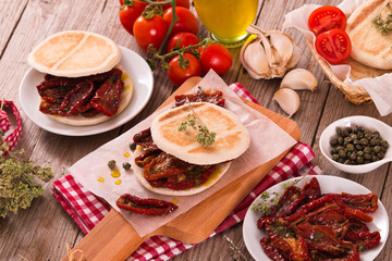 Tigella bread with sun-dried tomatoes.
