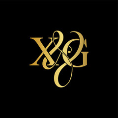 X & G X G logo initial vector mark. Initial letter X & G X G luxury art vector mark logo, rose gold, silver, gold color on black background.