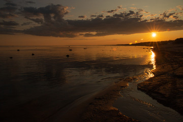 Fototapeta na wymiar sunset on the beach at Baltic sea