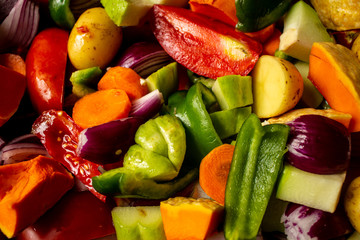 Vegetables of vibrant colors cut. Organic and healthy vegetables cut for cooking. Mix of food for vegetarians and vegans.