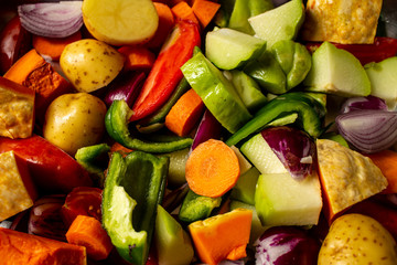 Vegetables of vibrant colors cut. Organic and healthy vegetables cut for cooking. Mix of food for vegetarians and vegans.