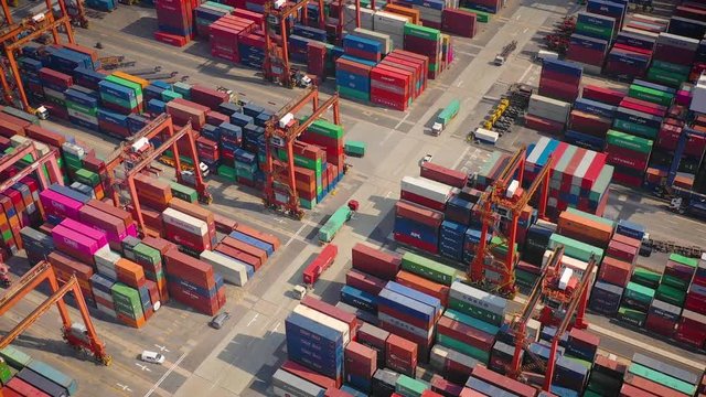 sunny day hong kong city port container terminal traffic aerial topdown panorama 4k  