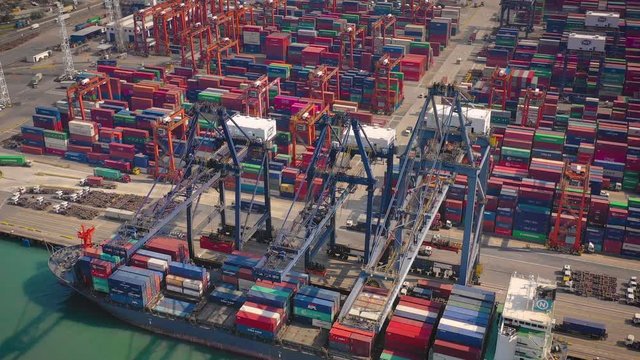sunny day hong kong city port container terminal ship aerial topdown panorama 4k  