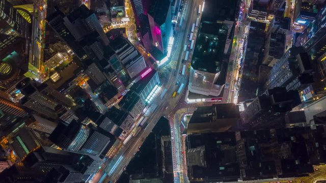 night illumination flight over hong kong city downtown traffic aerial topdown panorama 4k timelapse 