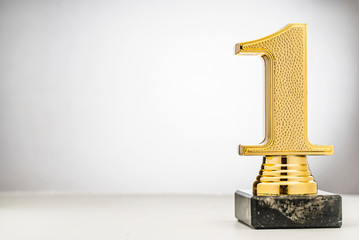 Winners 1st place gold trophy with copy space