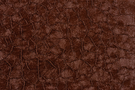 Cracked dark brown paint on metal, backgrounds. Abstract background, empty template. © Dmitriy Golbay