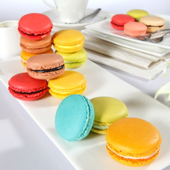 colorful macaroons on white background