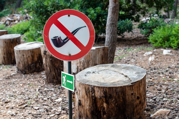 No smoking sign with tobacco pipe graphic