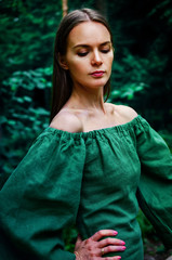 Fototapeta premium Beautiful young woman resting in the park