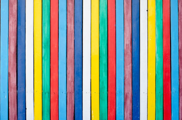 Placard of colorful  wooden planks as background . Full frame shot of multi colored wall .