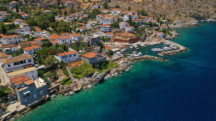 Fototapeta na wymiar Aerial drone photo of small picturesque seaside fishing village of Kamini in picturesque island of Ydra or Hydra, Saronic gulf, Greece
