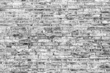 Grunge dirty white and black bricks wall as the abstract textured and background
