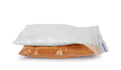 Cocoa and sugar in a bag on a white background