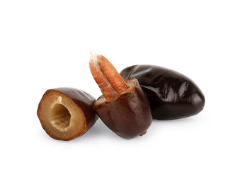 Fresh dates are whole and in a cut on a white background