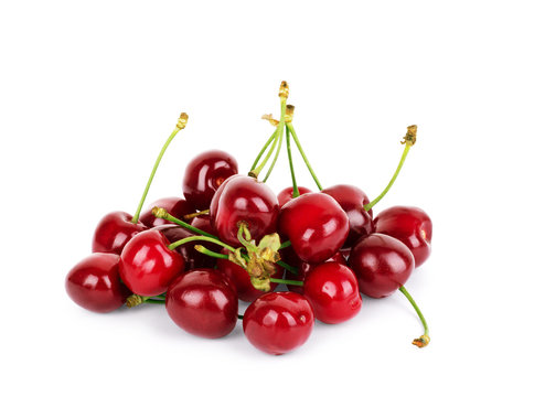 Ripe sweet cherry on a white background