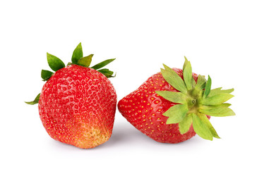 Two fresh strawberries on white background
