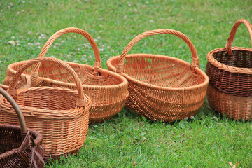 Vintage wicker baskets on green grass