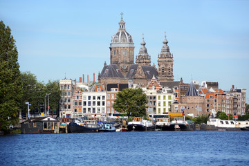 Fototapeta na wymiar Skyline of Amsterdam, Netherlands with Basilica of Saint Nicholas