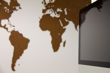 Computer screen and background worldmap