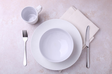 Beautiful white dishes and cutlery