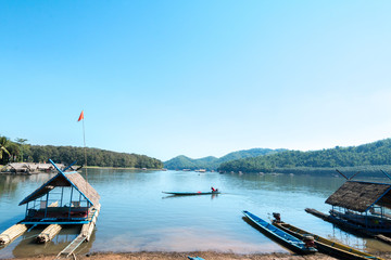 Fototapeta na wymiar Bamboo raft floating on lake in summer,Travel on Summer in Thailand