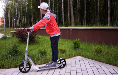 Girl on a sports scooter