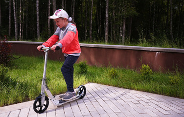 Girl on a sports scooter