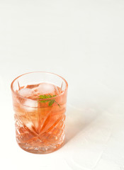 Fresh lingonberry cocktail on a white background