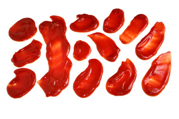 Red sauce splashes isolated on white background. Ketchup.