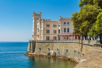 Fototapeta na wymiar Miramare castle building above Adriatic sea