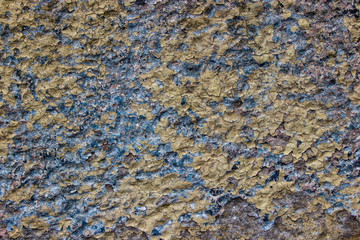 Yellow and blue paint chip stone grunge distress vintage colorful background texture