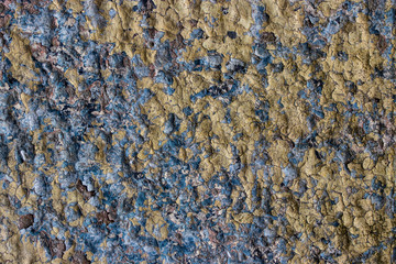 Yellow and blue paint chip stone grunge distress vintage colorful background texture