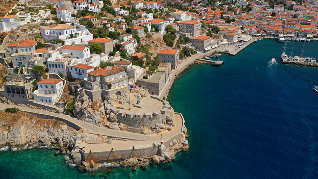 Aerial drone panoramic photo of picturesque port and main village of Hydra or Ydra island with beautiful neoclassic houses, Saronic gulf, Greece