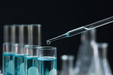 Glass laboratory chemical test tubes with liquid for analytical , medical, pharmaceutical and...