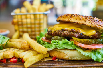 a delicious cheeseburger on the table