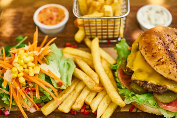 a delicious cheeseburger on the table