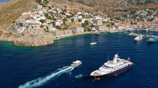 Aerial drone photo of picturesque port and main village of Hydra or Ydra island with beautiful neoclassic houses, Saronic gulf, Greece