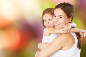 Happy Mother and daughter hugging