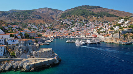 Fototapeta na wymiar Aerial drone photo of picturesque port and main village of Hydra or Ydra island with beautiful neoclassic houses, Saronic gulf, Greece