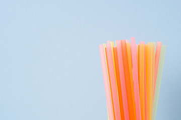 Abstract a colorful of plastic straws used for drinking water or soft drinks. Selective focus. Copy space