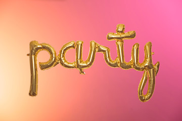 Party balloon on color gradient