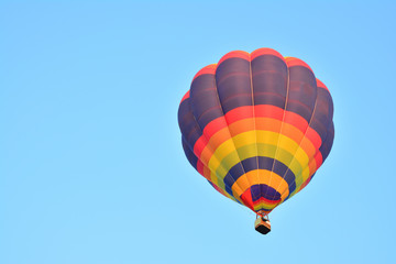 Colorful Hot Air Balloons in Flight over blue sky