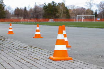 White-orange cones on the road. Road Works Fencing