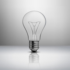 Realistic light bulb on gray 3D background