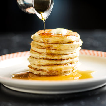Pancake stack with poured syrup