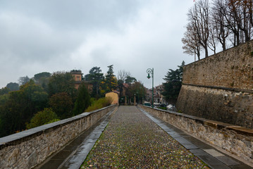View of city gate with the lion of San Marco in Bergamo town, Italy.